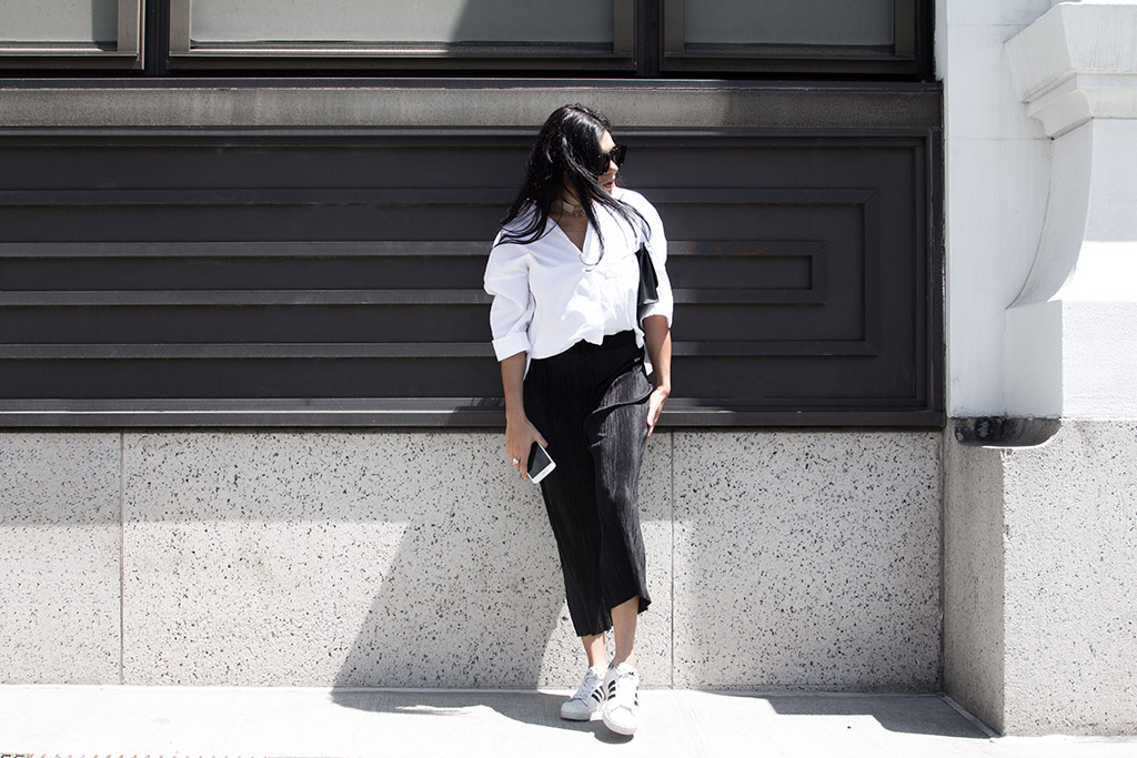Black and white outfit, white oversized shirt, black pleated culottes